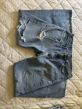 Wrangler Distressed Light Blue Men’s Relaxed Jeans